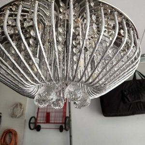 Overhead Shiny light, not my type. Hardware included.